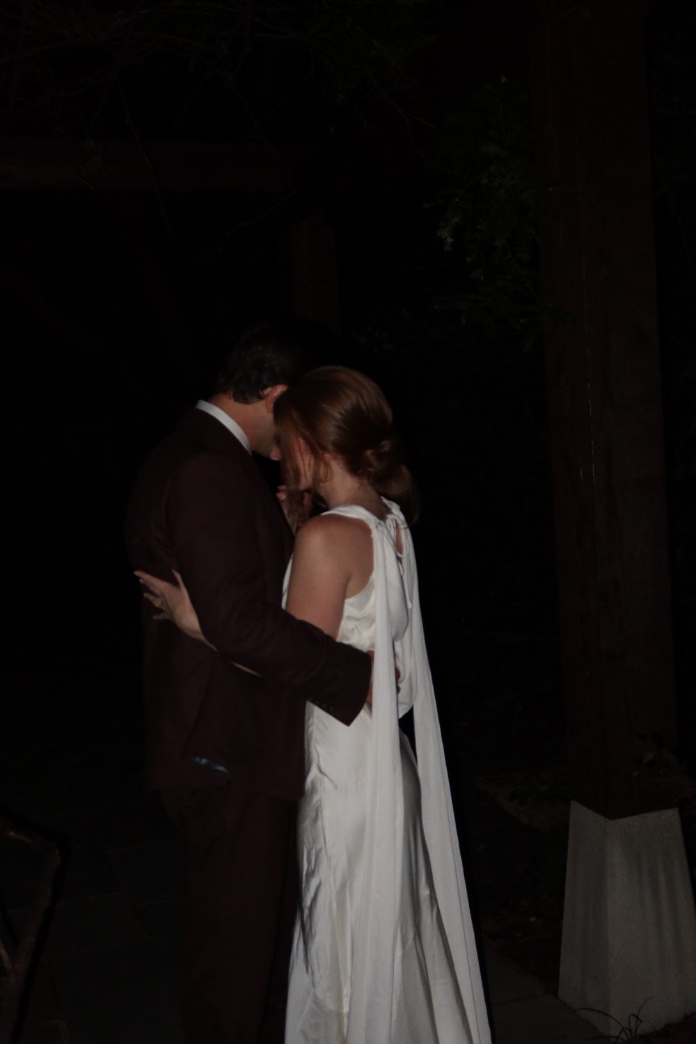 Cody and Katrina close together in the dark