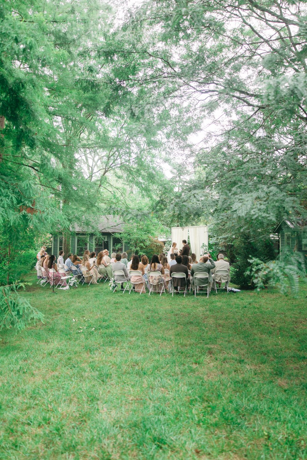 The whole ceremony from the far end of the garden