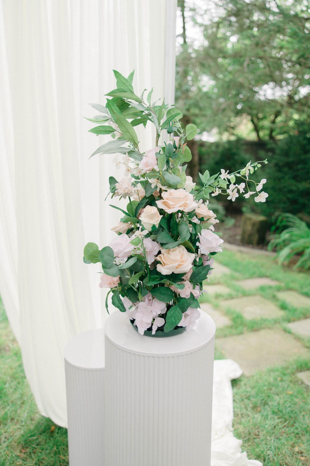 Florals tied to the aisle chair
