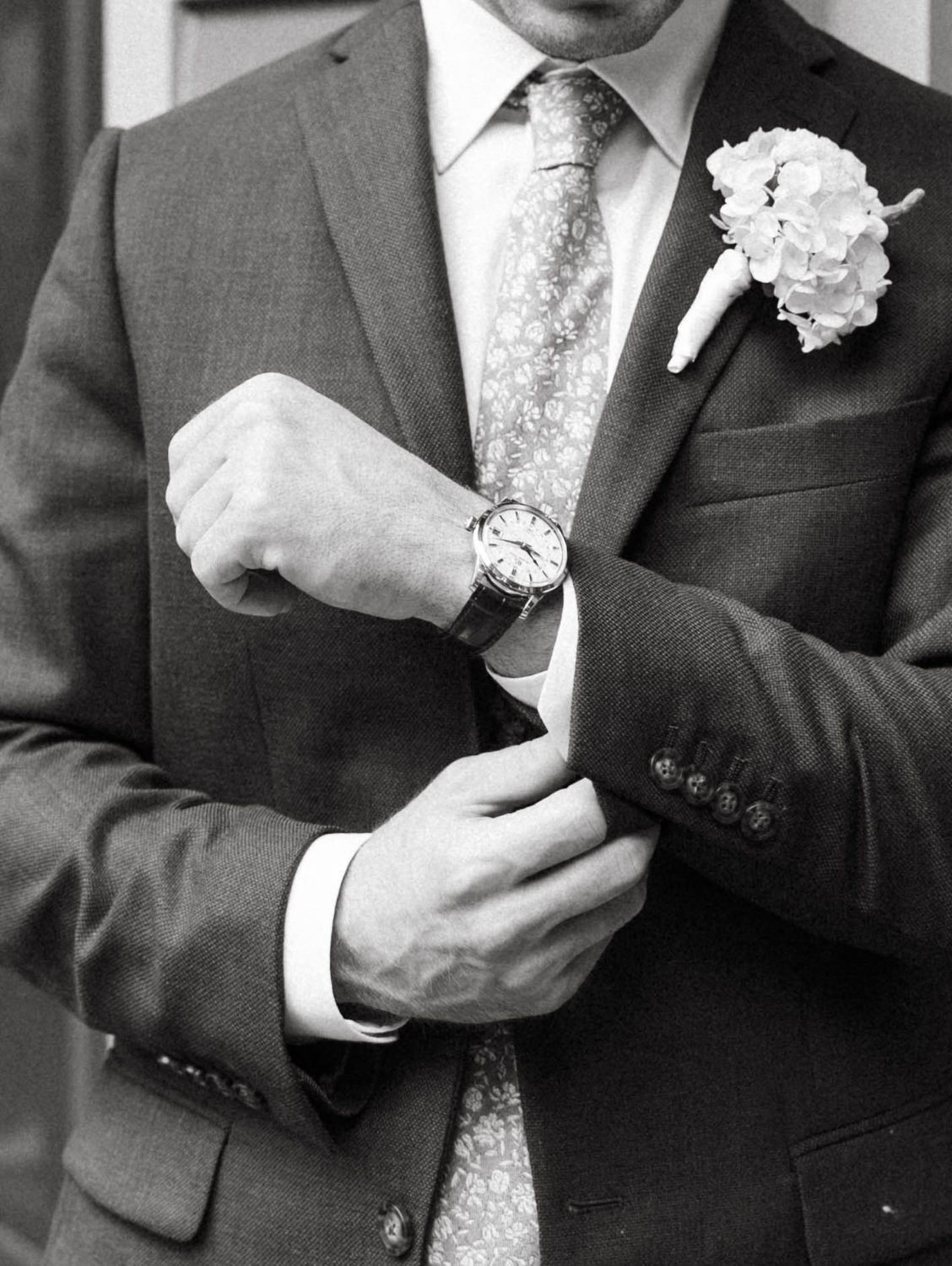 Cody fastening his cuff