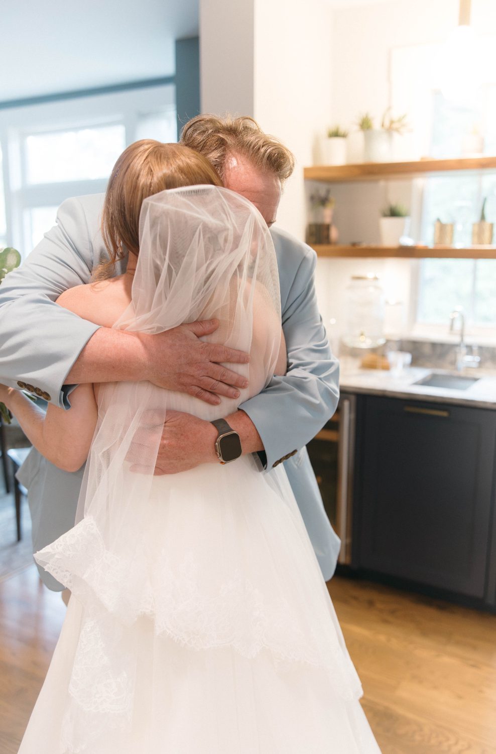 Katrina's dad seeing her in her dress for the first time