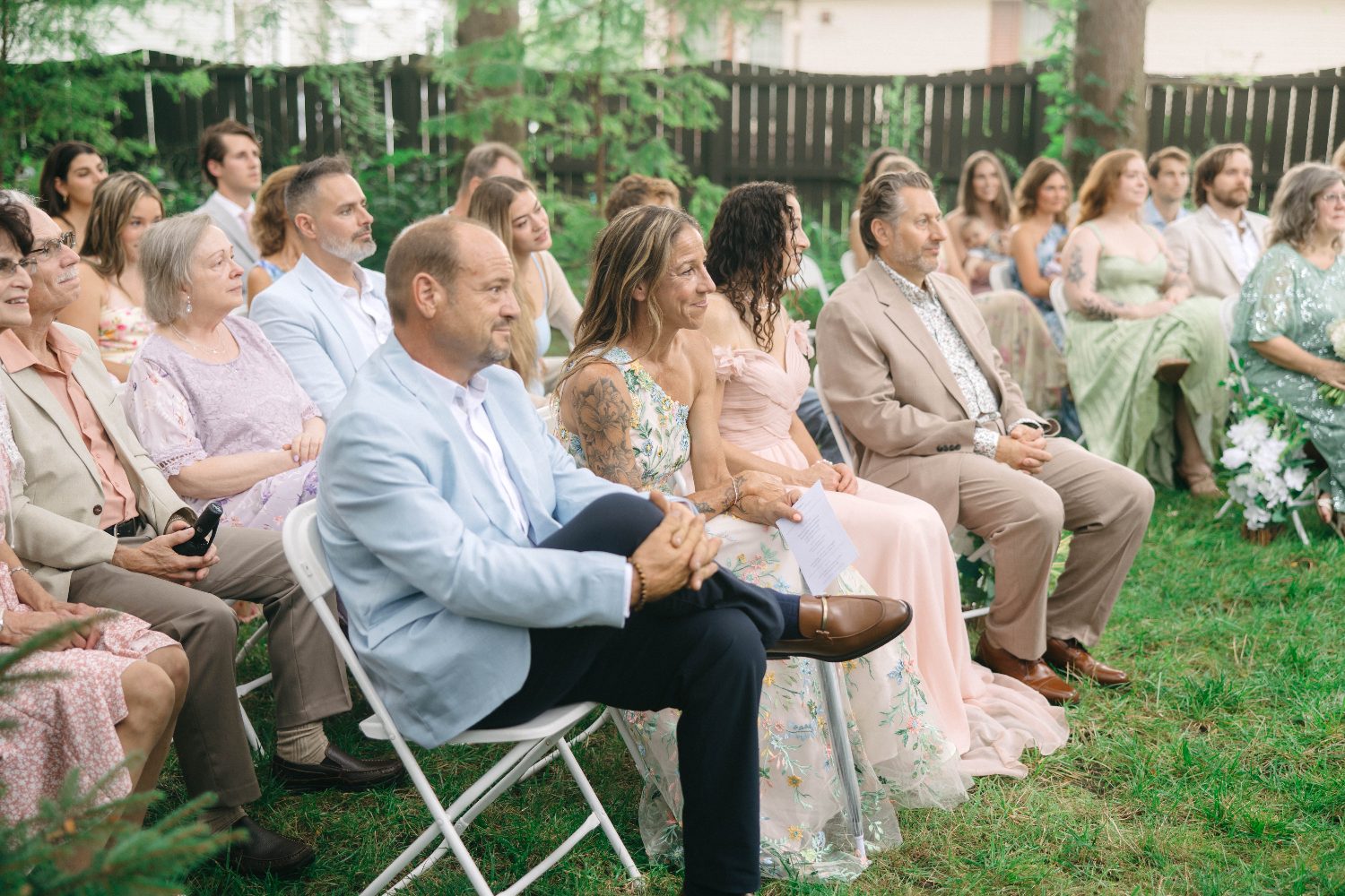Guests seated on the lawn